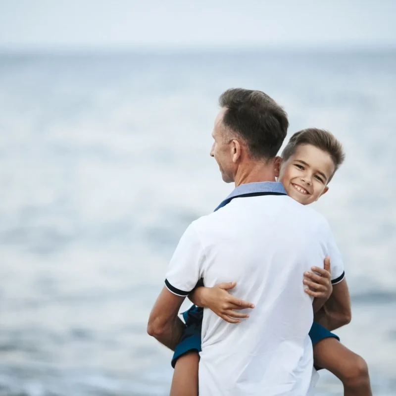 dad-is-holding-son-scaled (1)